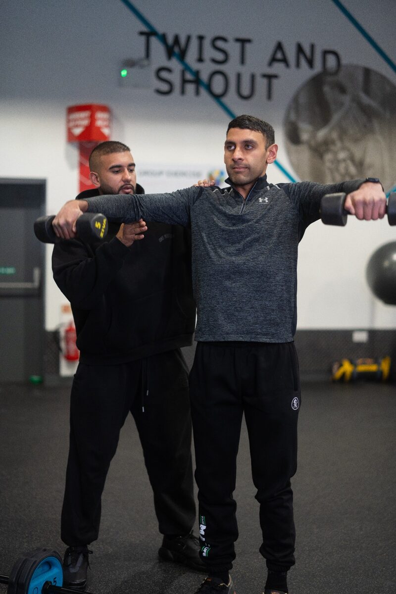 Haaroon Ali coaching a training session